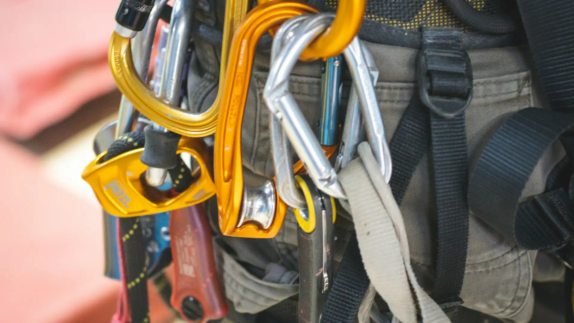 a close up of a bunch of carabines and hooks